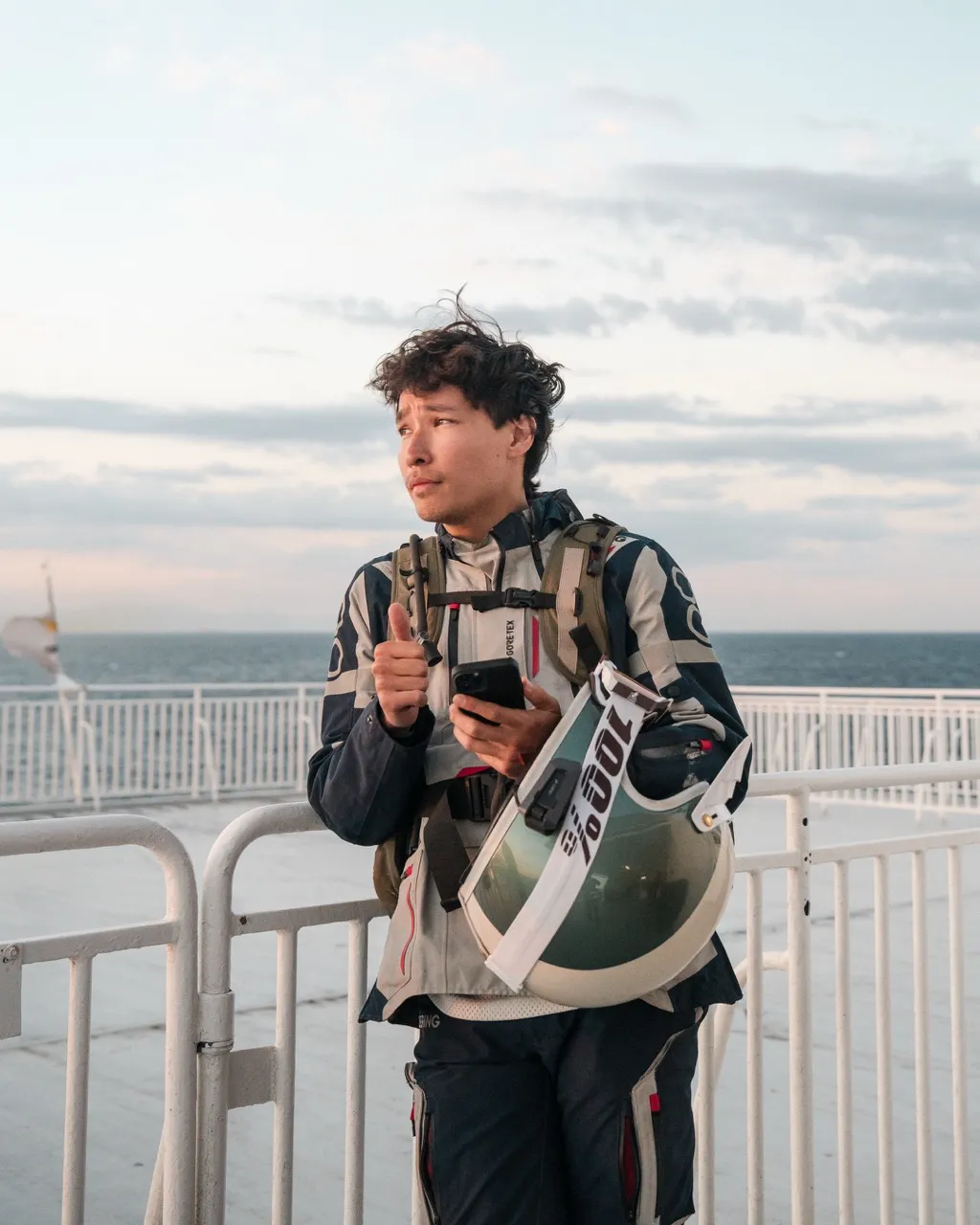 Adventure motorcycle rider in epic landscape